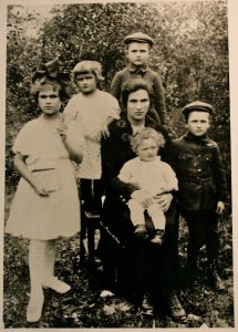 My grandmother, Ides Bronfeld, surrounded by children (standing from left) Hinda Ethel, Sura (Sally), Al, Herzek (Benny), and Marge (in her lap), taken in Zawichost, Poland, circa 1926.